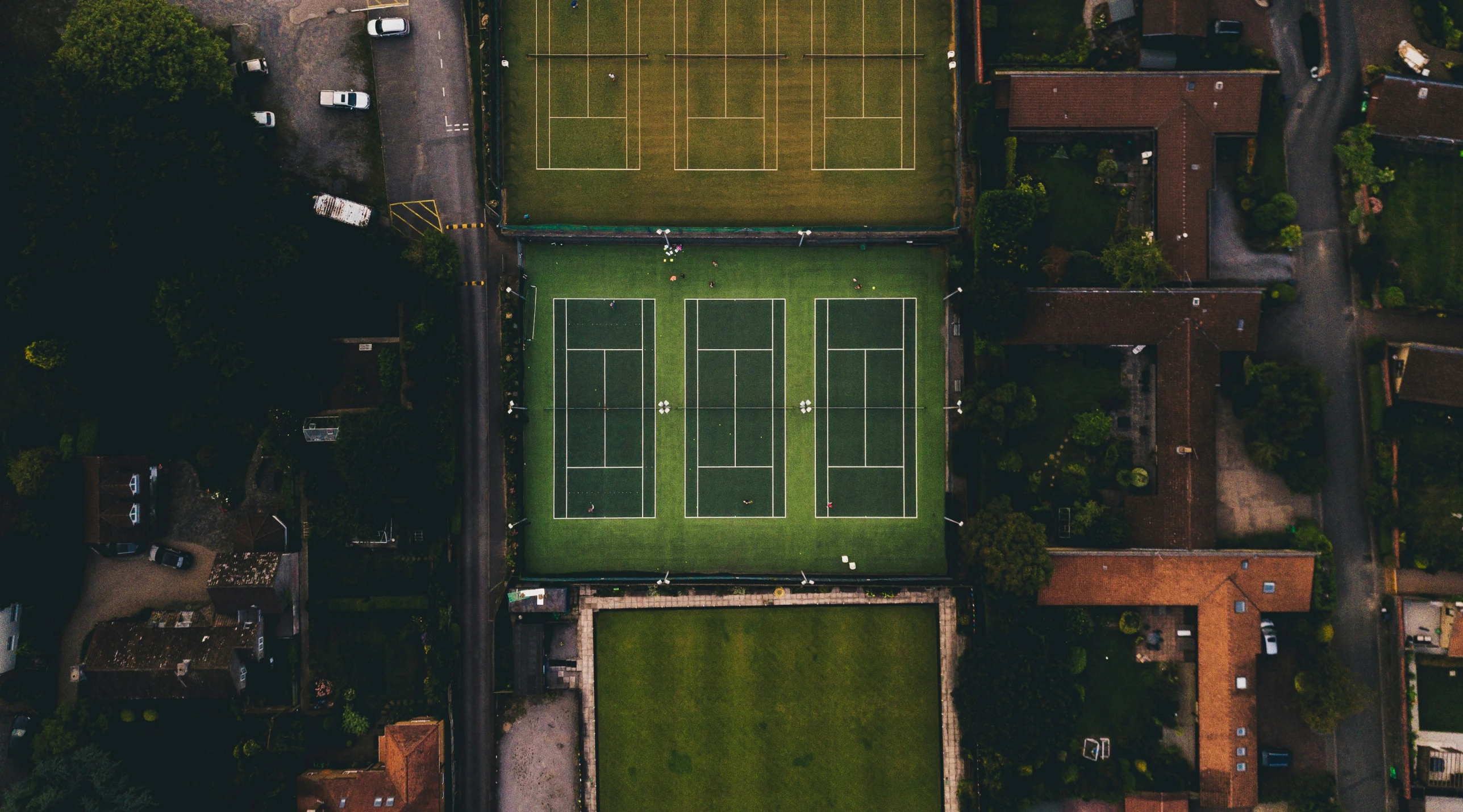 aerial view of a soccer field and buildings