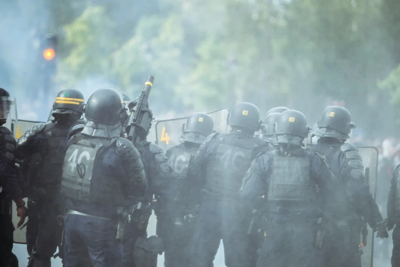 some police officers are standing next to each other