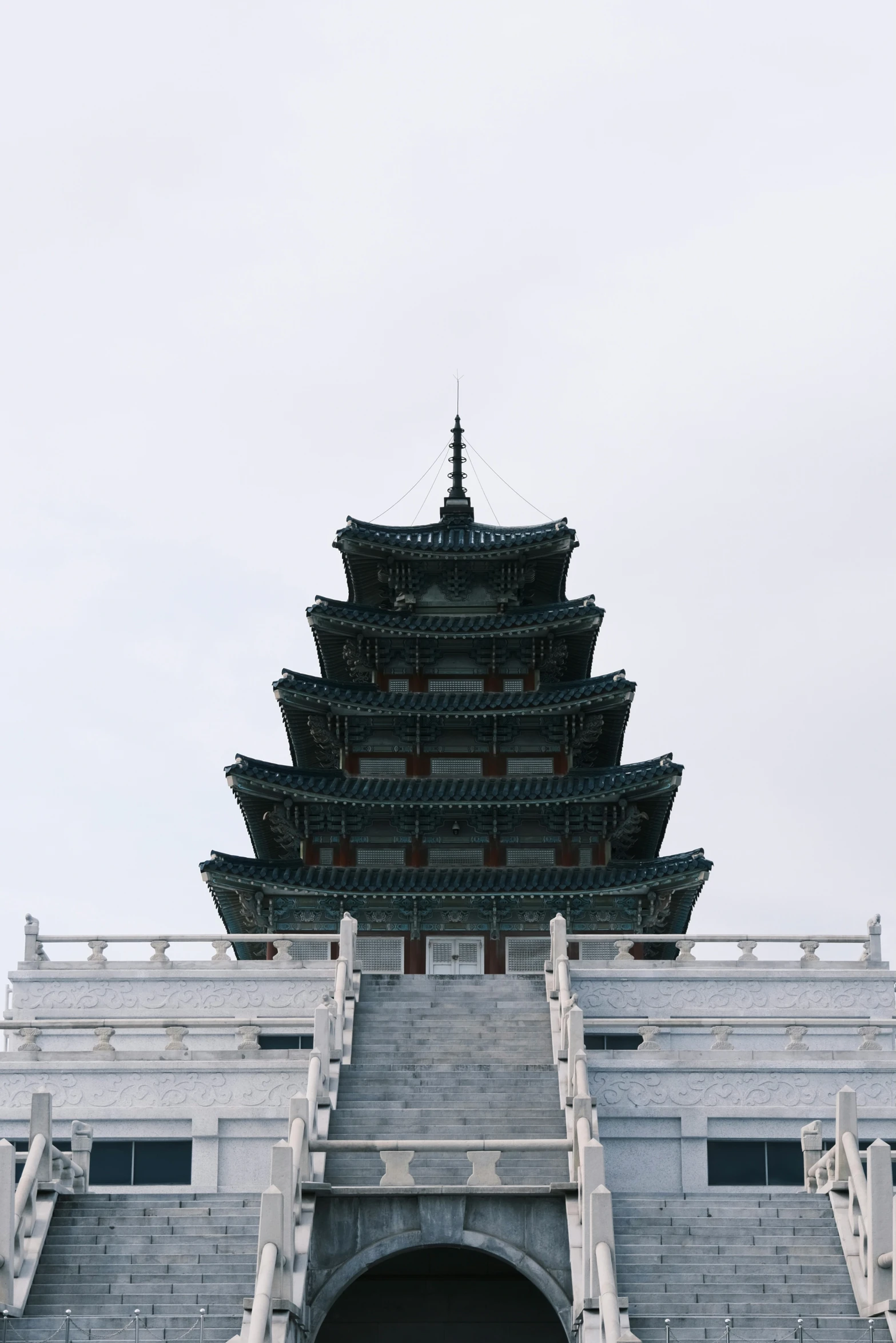 a tall tower sitting next to a very tall building