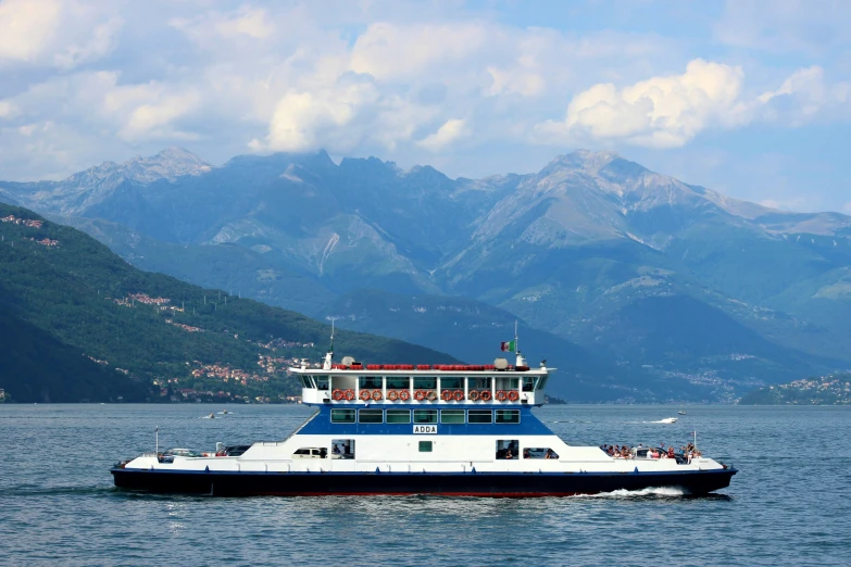 a boat with two people on it out in the water