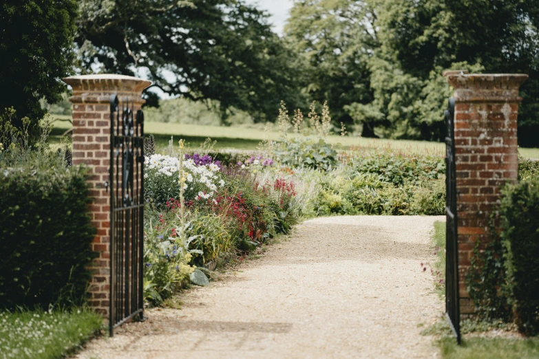 the view through a gate into a garden