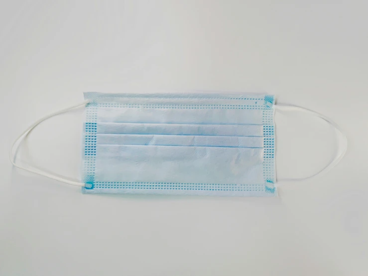 three surgical masks, one with five wire and two without