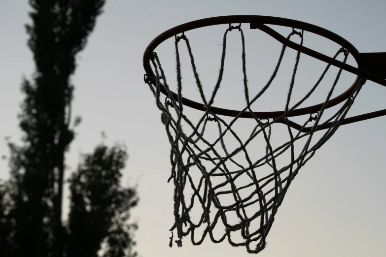 a basketball net with several chains hanging down