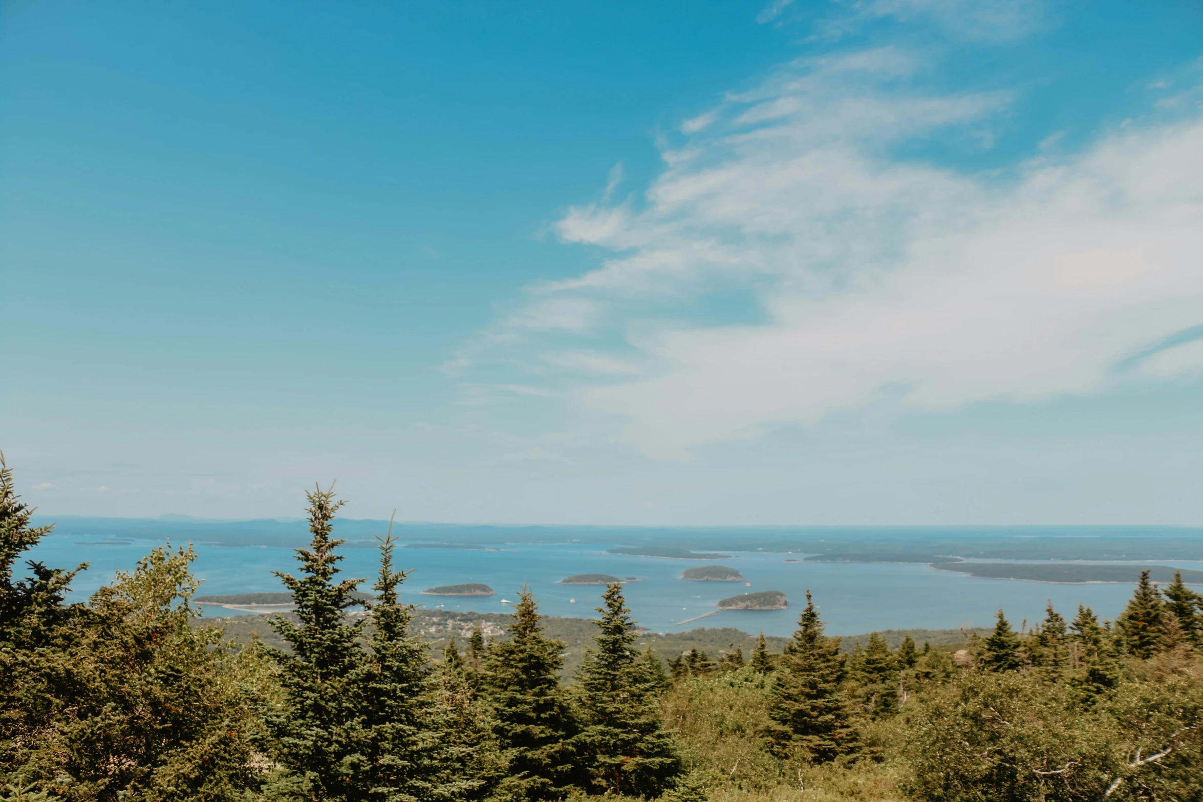 a scenic mountain overlook over the ocean