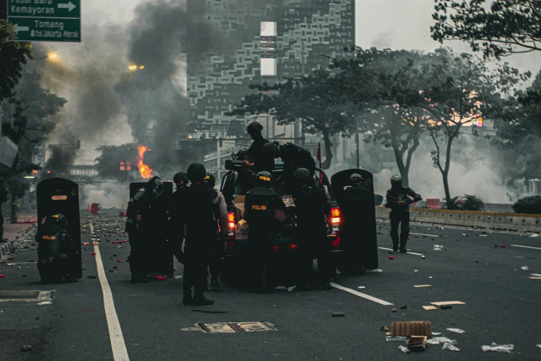 firemen extinguishing at a massive building fire