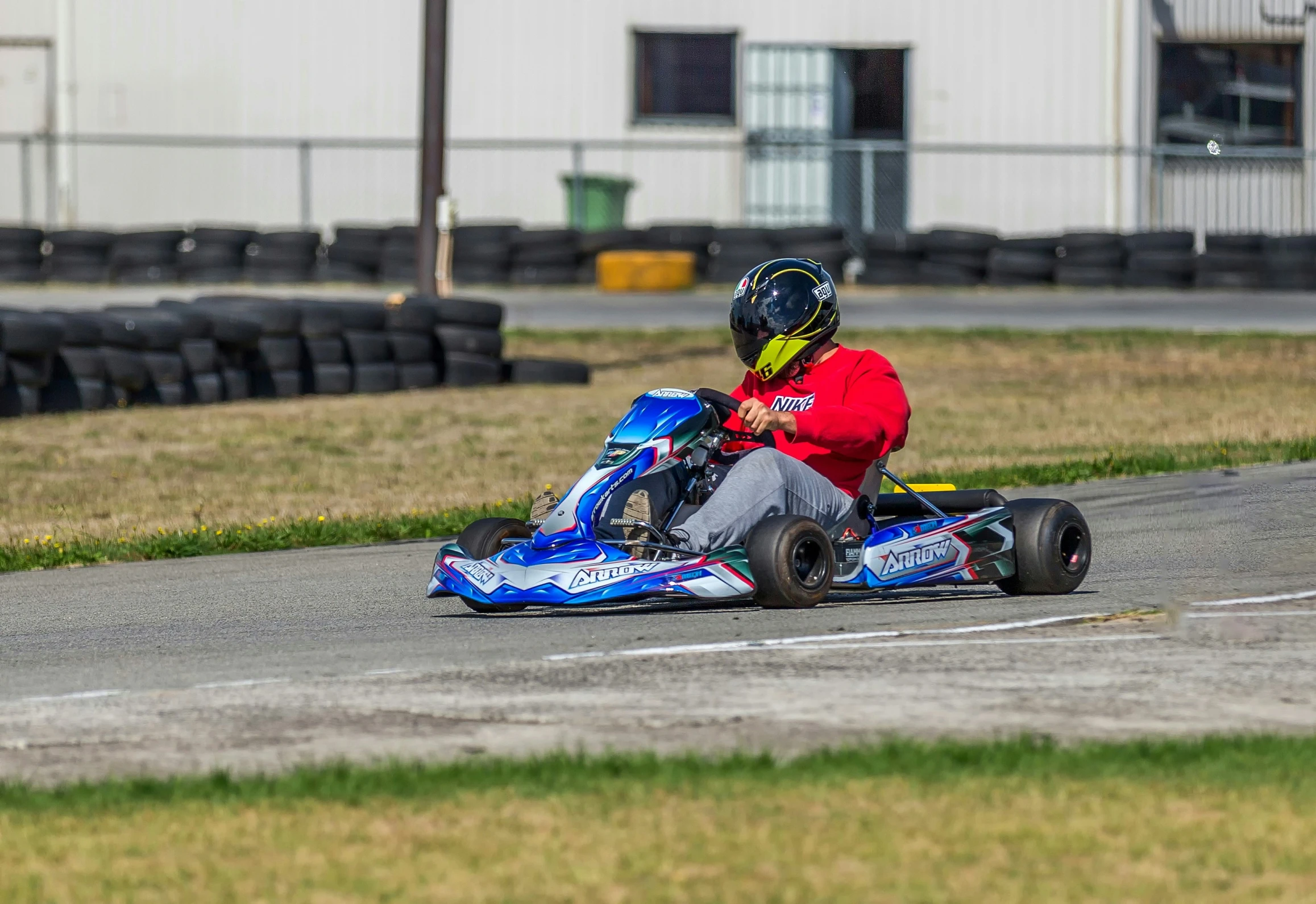 a person in go kart racing, waiting for the next race