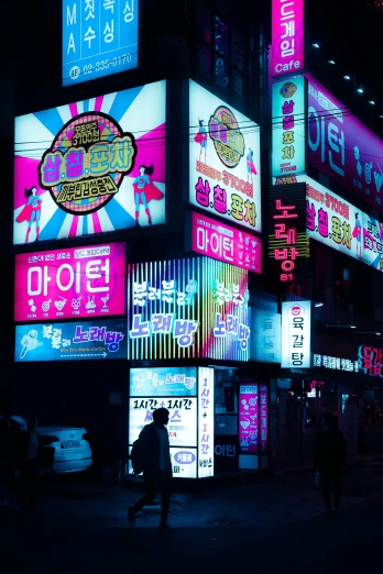 neon signs are visible on the illuminated buildings