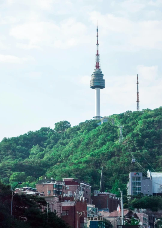 an image of a cityscape with a tall tower on the top