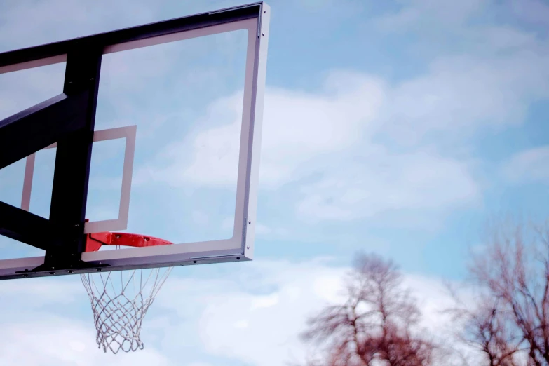 a basketball net with a red object attached to it