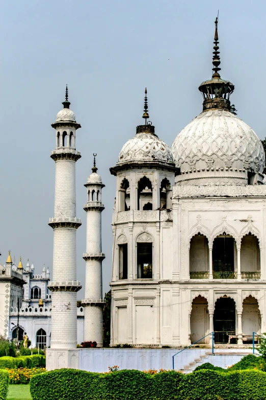 an ornately detailed building with domes and minalis