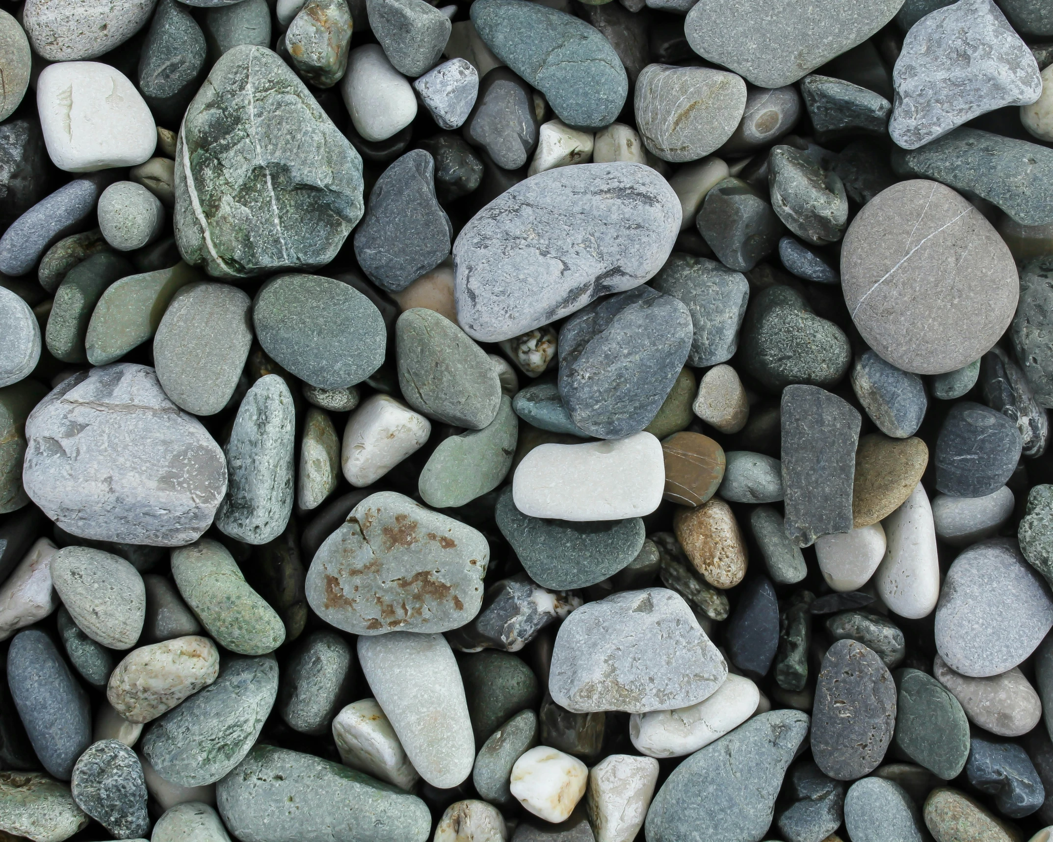 a bunch of pebbles that are all together