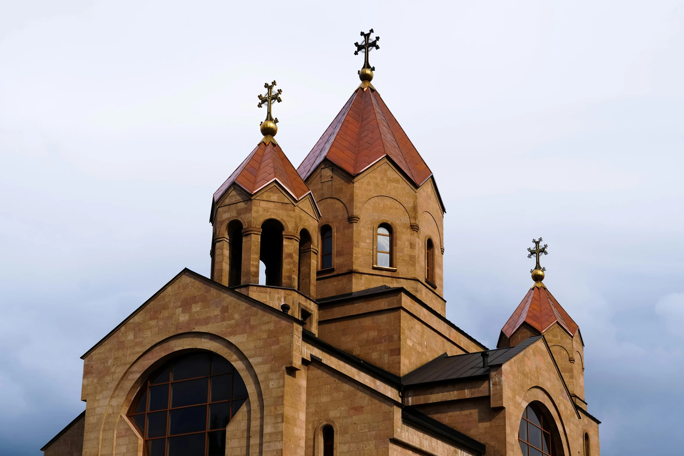 the church has two towers with crosses on it