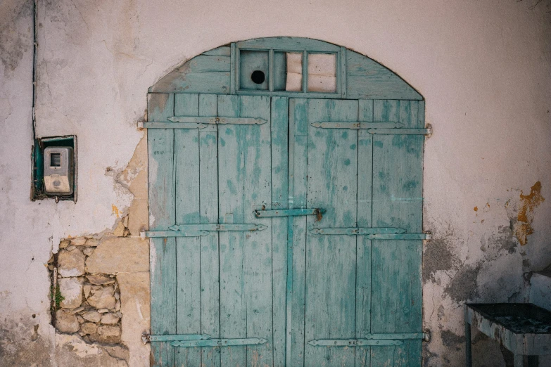 an old door with some paint on it