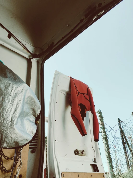 view from inside of the front part of an rv truck showing the inside door and back of the vehicle