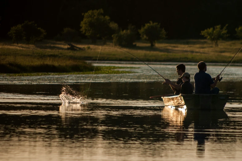 two people in a boat in the water