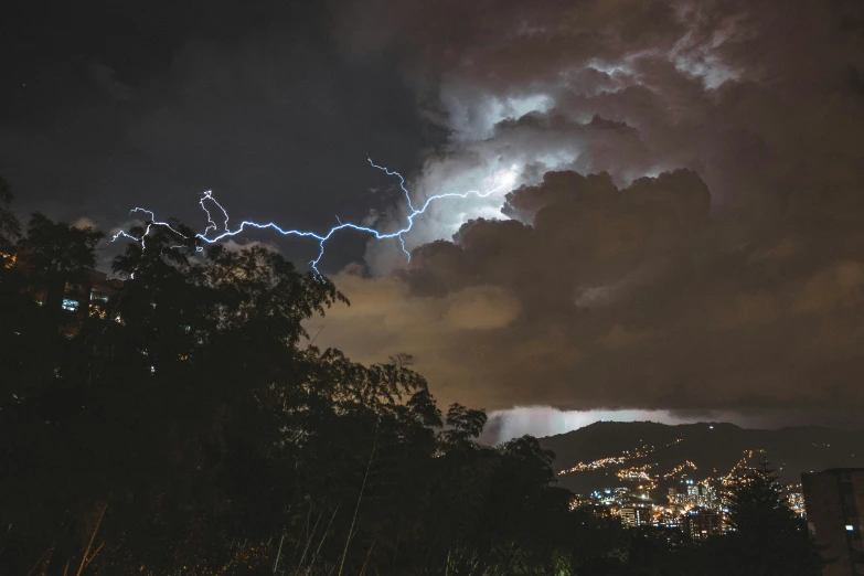 a cloud filled with lots of lightning and clouds