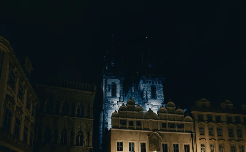 a view of a very large building lit up at night