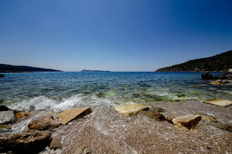 the ocean and rocks is clean in the day