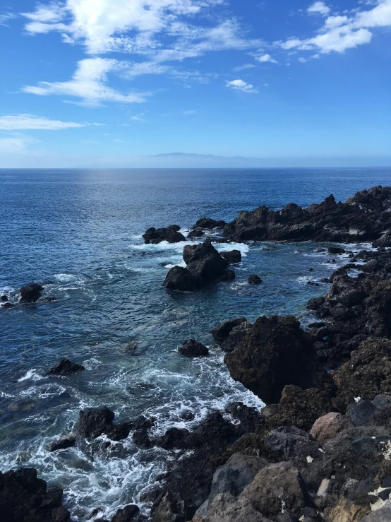 there is a lighthouse near the water