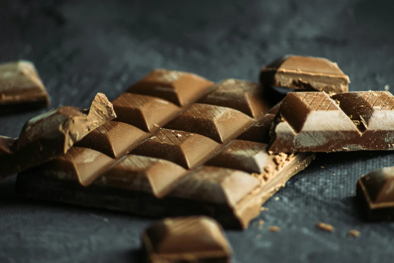 dark and white chocolate on a grey surface