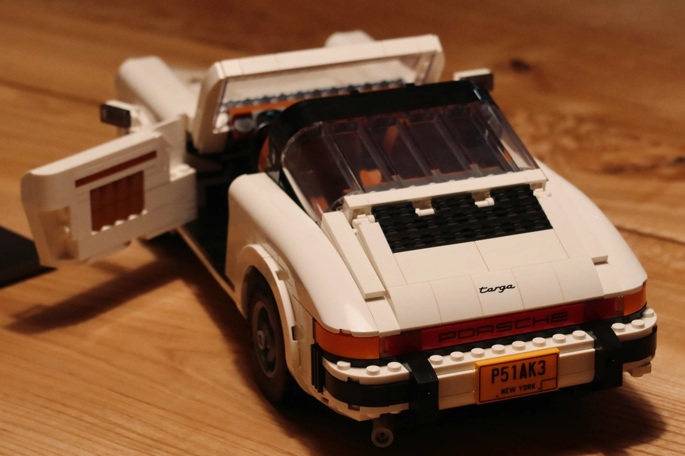 a close up of a toy car on a table