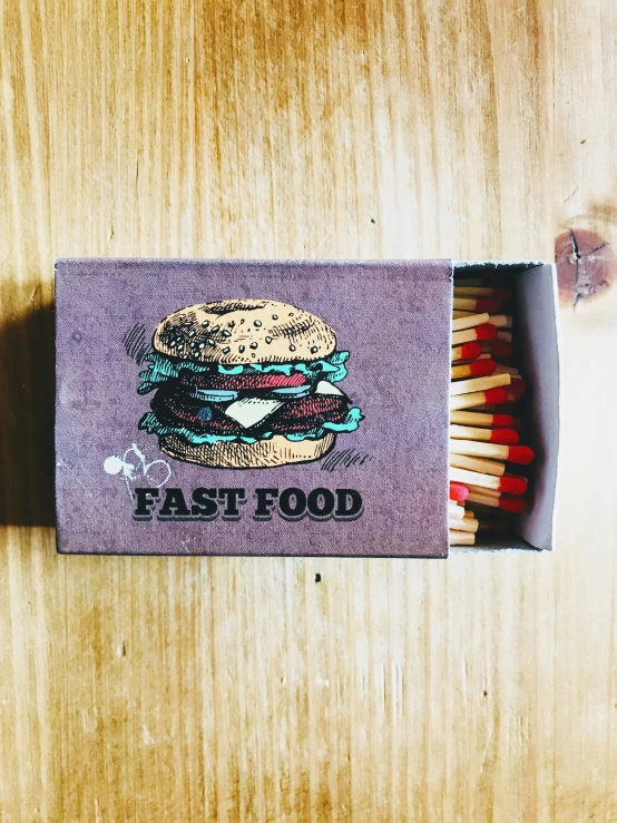 a sandwich matchbox is sitting on the table