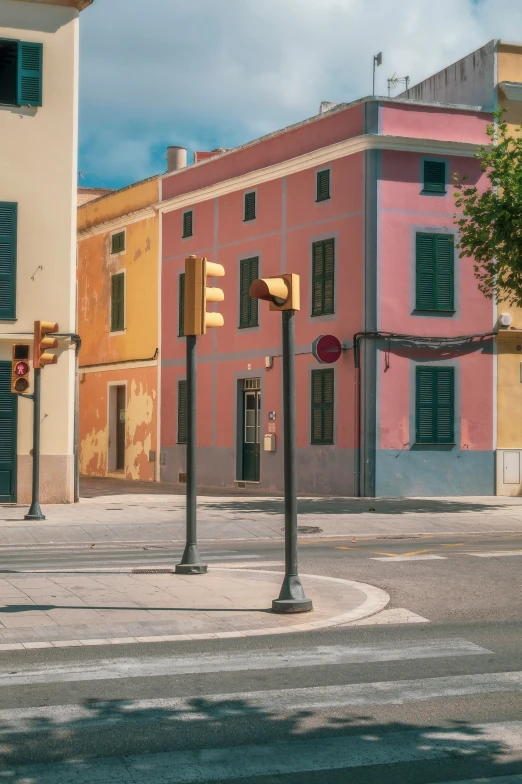 a city street corner with some buildings in the background