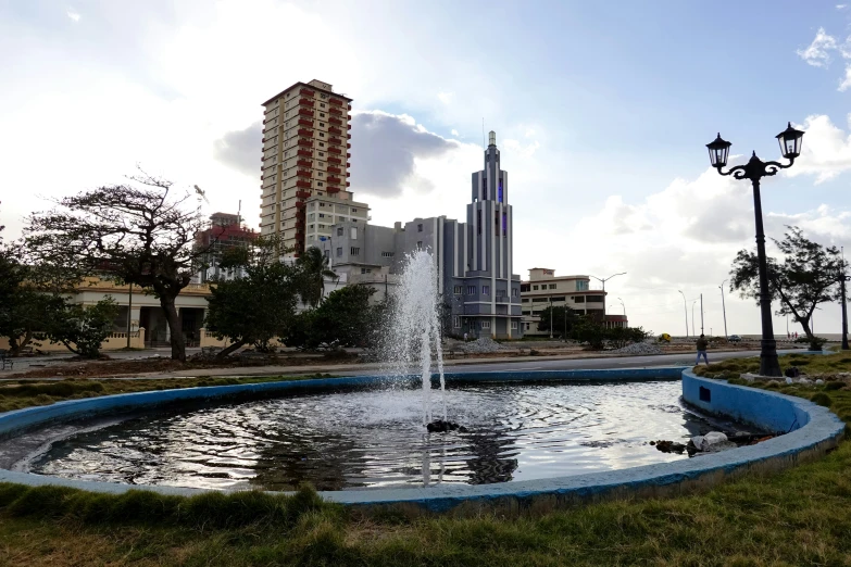 a fountain with large jets spewing water out of it