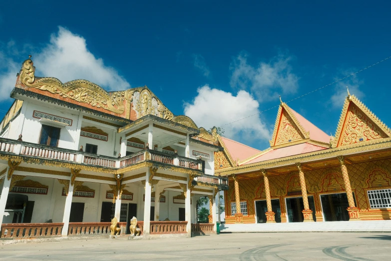 the front of a large building with a lot of columns