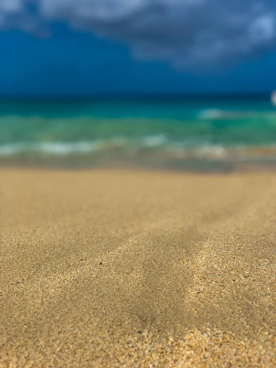 a couple of small plastic items sitting on top of a beach