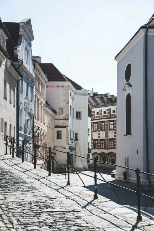 old houses line the city with steep buildings