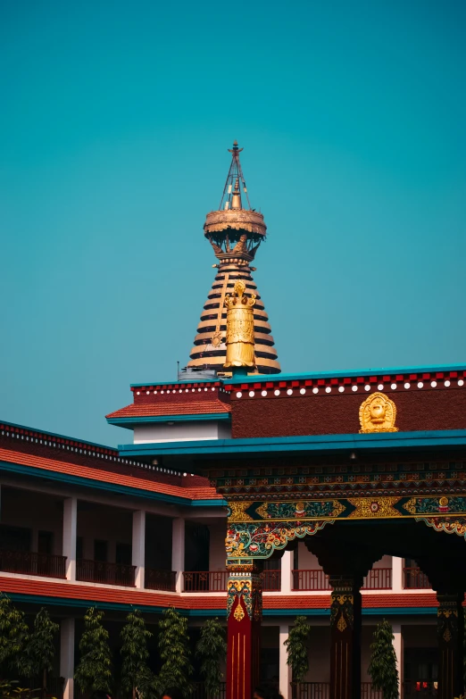 a view of an ornate roof and tower in an ancient asian style