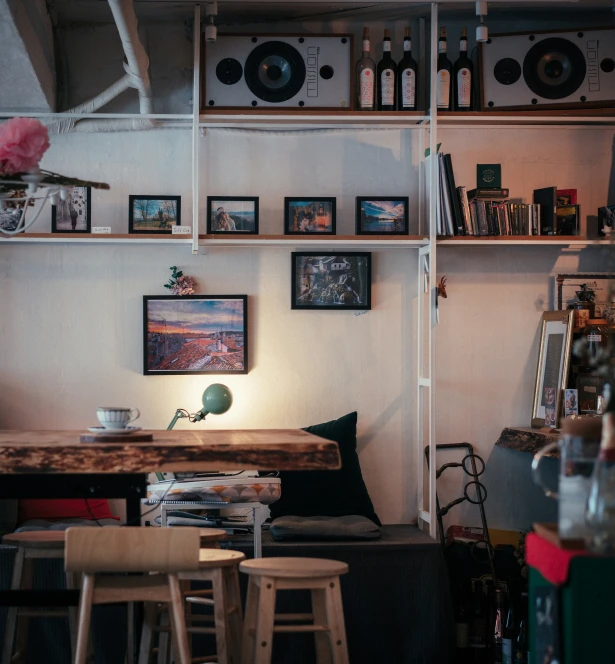 shelves and chairs that have been arranged along the wall