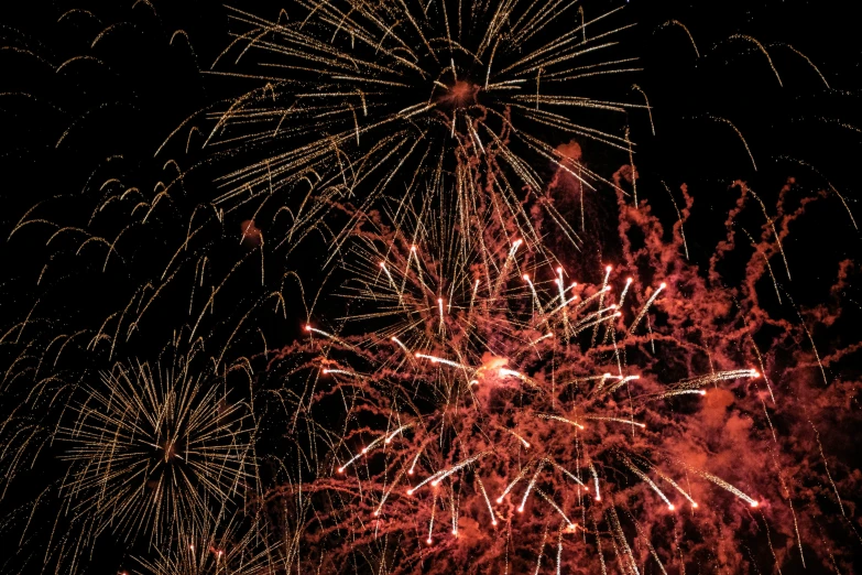 fireworks being lit in the sky and on display