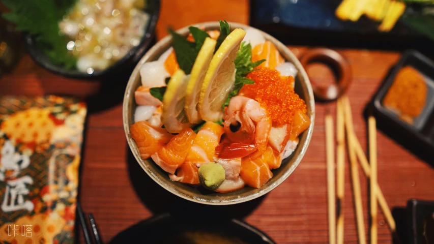 a bowl with some food on a table