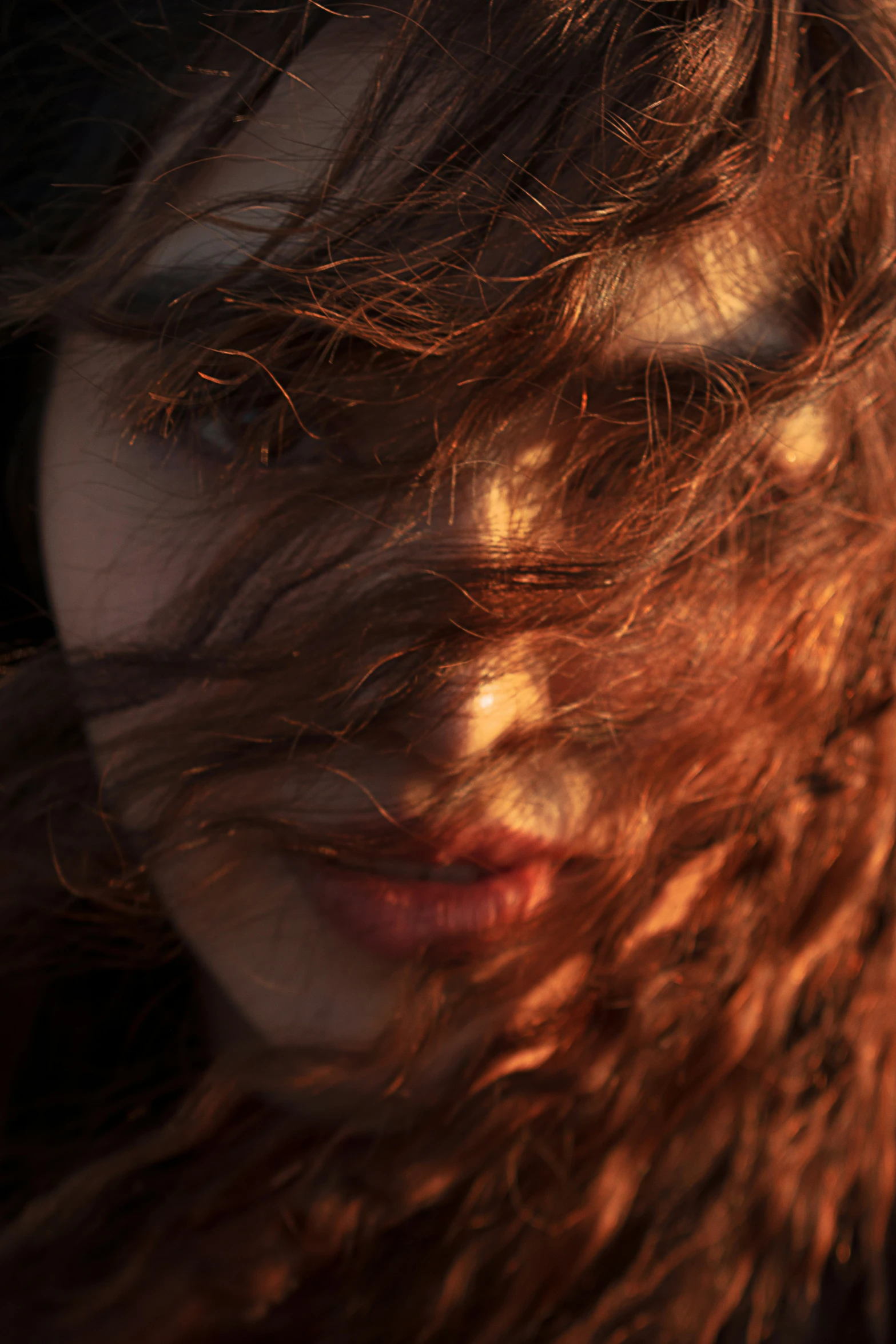 a woman with brown hair and light blue eyes