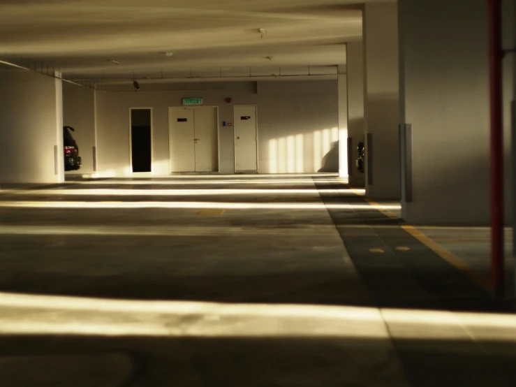 an empty building with a bunch of lockers in the floor