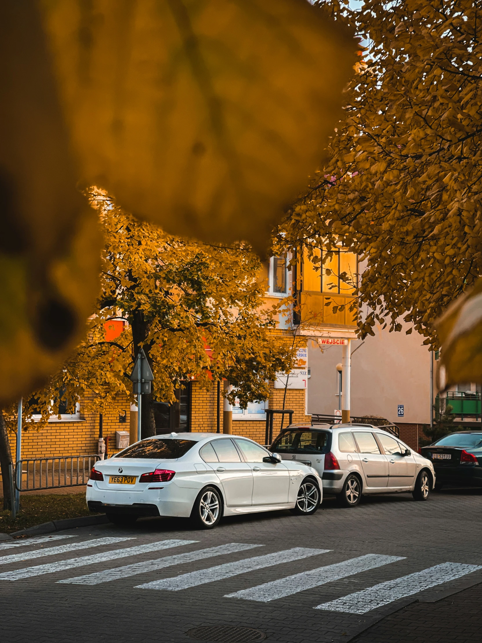 two vehicles driving down the road with traffic