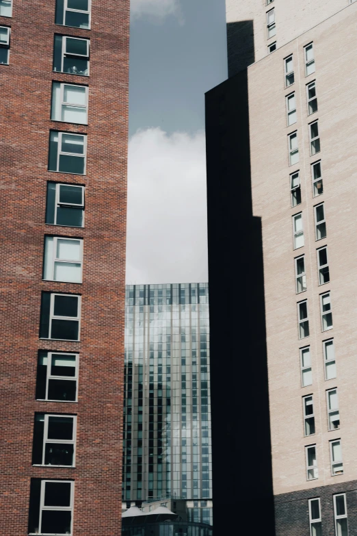 a row of brick buildings with windows and balconies