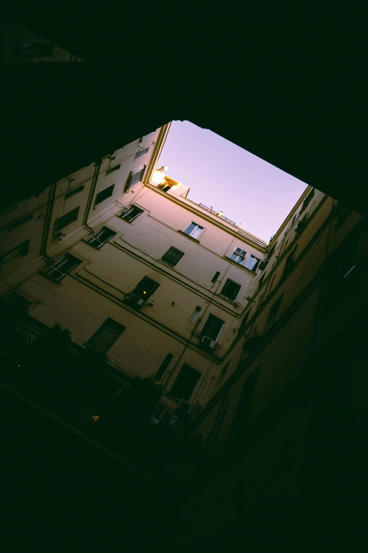 a building viewed through an open window