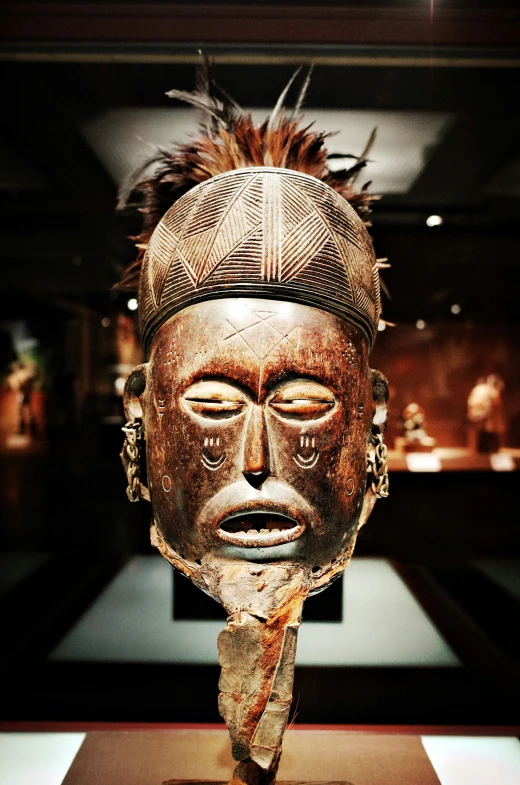 a mask that looks like a warrior on display