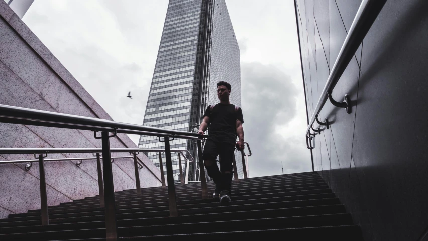 a person is climbing stairs to an office building