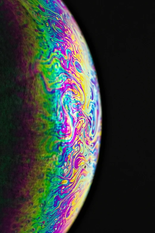 the planet is colored with iridese colors