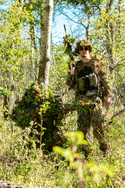 a man in costume walking through the woods