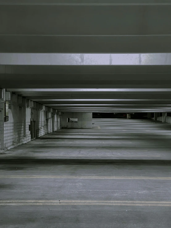 parking lots in black and white with a fire hydrant under