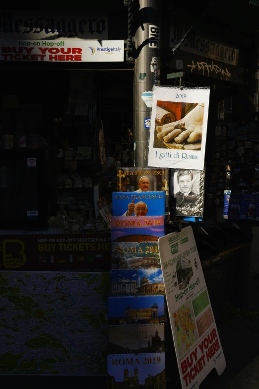 a display of menus at a city food stand