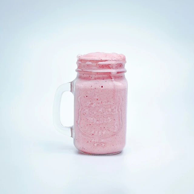 a jar that is filled with some kind of food