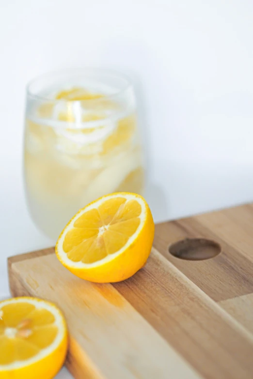 sliced orange on  board with drink pitcher