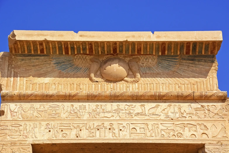 an image of a stone structure with egyptian writing on it