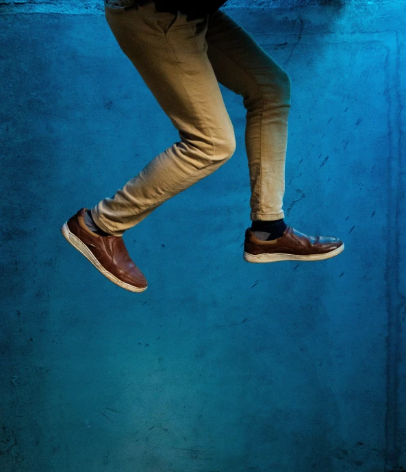 an image of the legs of a person jumping